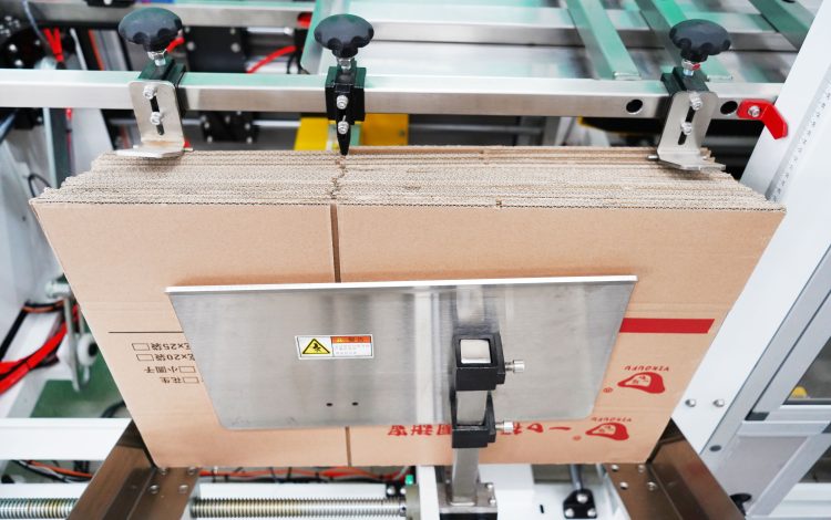 Automatic Tape Carton Unapcking Machine - Image 7